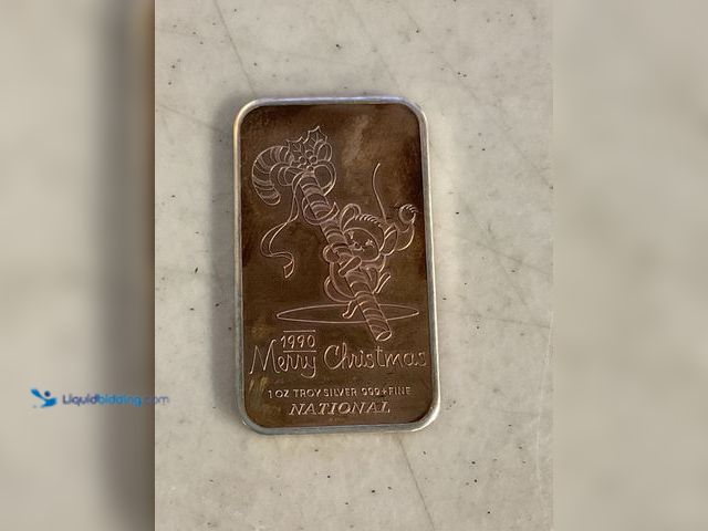 Lot 49-1830038 - 1OZ TROY .999 FINE SILVER BAR “1990 MERRY CHRISTMAS” #COINS0219