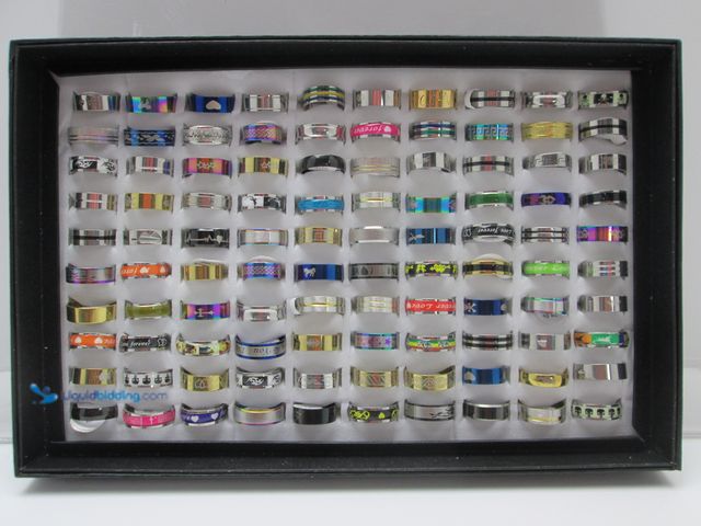Lot 49-5492832 - Bulk Lot of 100 Stainless Steel Rings in Retail Display Box - NEW - Includes Men's and Women's Sizes...