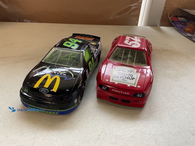 Lot 49-5341520 - LOT OF 2 PRE-OWNED 1/24 SCALE DIECAST CARS INCLUDING #94 BILL ELLIOTT BATMAN FOREVER AND #57 HEINZ K...