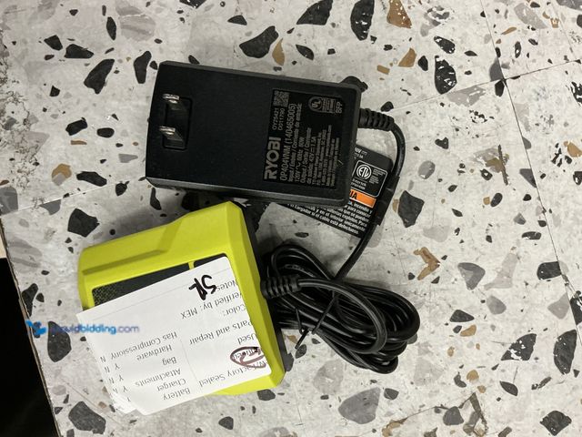 Lot 49-3564688 - Ryobi OY25421 Battery Charger, Unused.