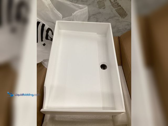 Lot 49-5551686 - VIGO Montauk Modern White Matte Stone 23 in. L x 15 in. W x 5 in. H Rectangular Vessel Bathroom Sink...