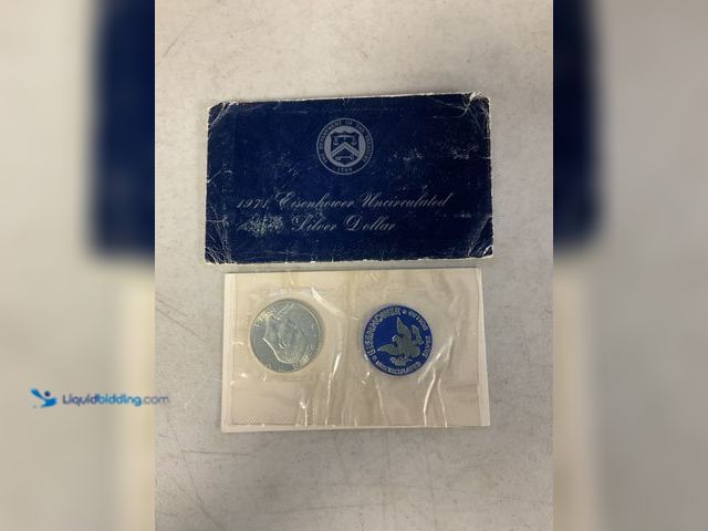 Lot 49-1830037 - 1971 EISENHOWER UNCIRCULATED SILVER COIN IN PLASTIC SLEEVE AND ENVELOPE #COINS0219