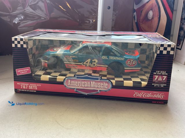 Lot 49-1804634 - #43 RICHARD PETTY STP 1/18 SCALE DIECAST CAR.