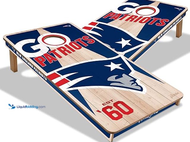 Lot 49-5411705 - YouTheFan NFL 2’ x 4’ :New England Patriots Professional Wood Cornhole Game. Model: B0DF32HJMQ. Unus...