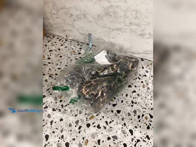 Lot 49-3527941 - Leopard Print Storage Handbag for Women Item is unused.