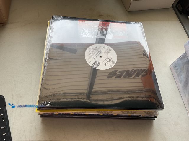 Lot 49-1804511 - 20 FACTORY SEALED VINYL RECORDS.