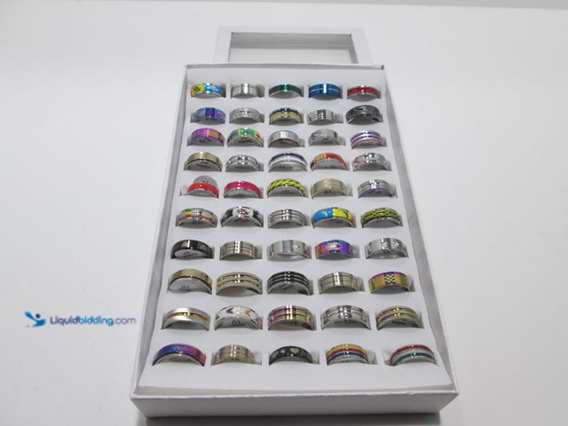 Lot 49-1803890 - Bulk Lot of 50 Stainless Steel Rings in Retail Display Box - NEW - Includes Men's and Women's Sizes/...