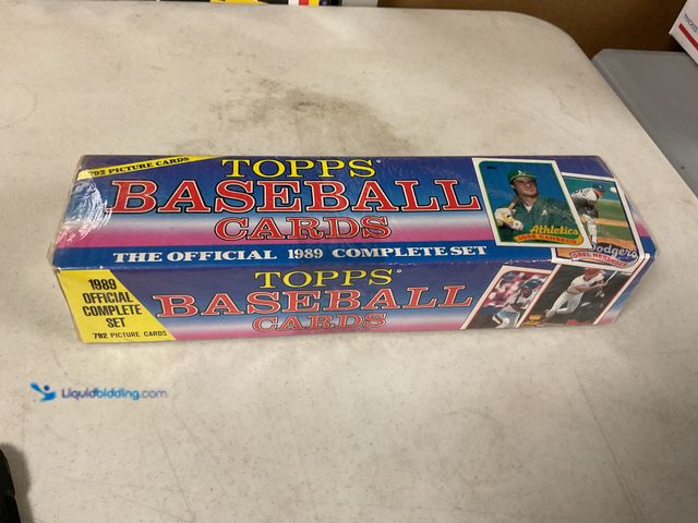 Lot 49-1505408 - COLLECTIBLE FACTORY SEALED 1989 TOPPS BASEBALL COMPLETE 792 CARD SET INCLUDING JOSE CANSECO AND MORE...