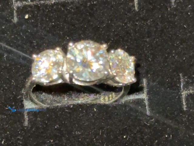 Lot 49-1814690 - Sterling silver Moissanite ring size 8 or 9. New never worn.
