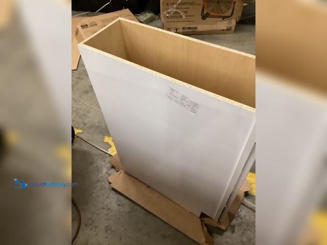 Lot 49-5407100 - White Cabinet 9" w x 25" deep (including door thickness) x 34.5" tall. Unused, some chips