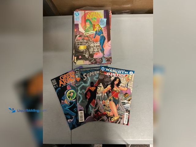 Lot 49-1830572 - COLLECTIBLE LOT OF 20 COLLECTIBLE COMIC BOOKS FROM DC, MARVEL AND MORE. INCLUDING JUSTICE LEUGUE, TR...