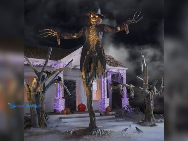 Lot 49-1526670 - Home Accents Holiday 15 ft. Gruesome Grounds Giant-Sized Animated LED Worricrow H10, Model # 25SV248...