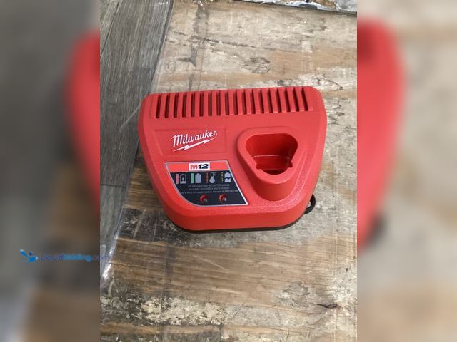 Lot 49-5448960 - Milwaukee M12 12-Volt Lithium-Ion Battery Charger. Model # 48-59-2401. Unused