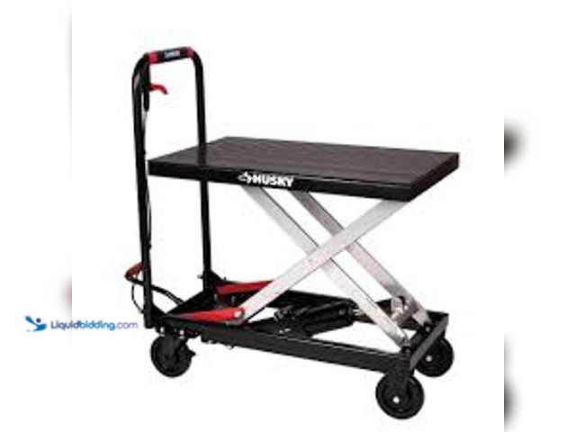 Lot 49-5485457 - Husky 500 lb. Hydraulic Lift Table. Model # HPL4005N-HV-TH. Used slightly. Dusty from storage