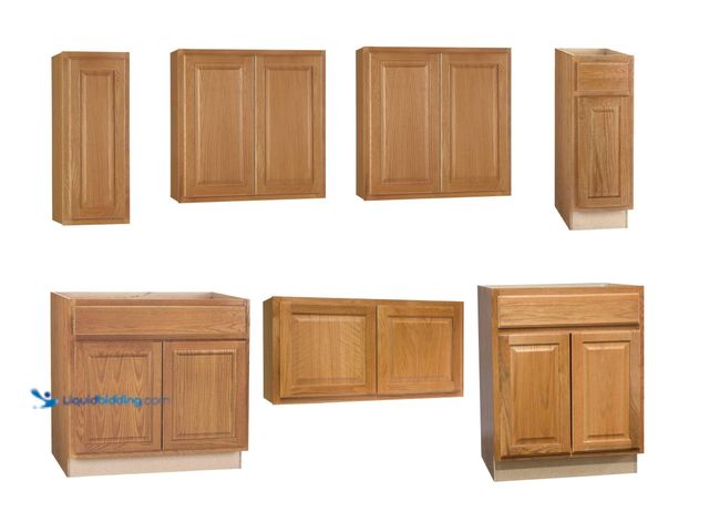 Lot 49-1551037 - Large Lot of Kitchen Cabinets Including: 4 Upper and 3 Lower Wooden Medium Oak  Kitchen Cabinets wit...