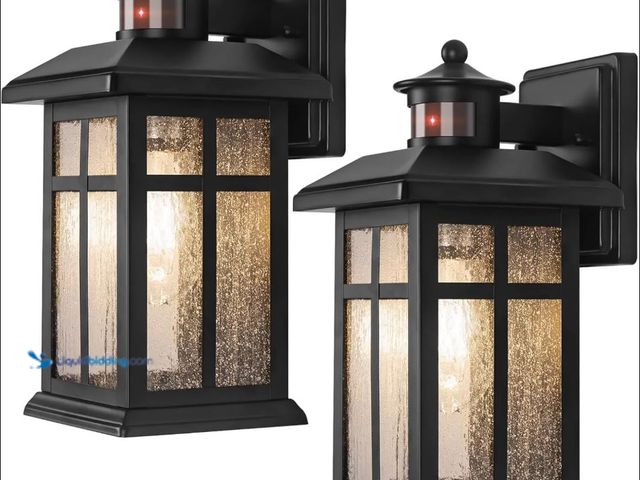 Lot 49-5460583 - 2-Pack Motion Sensor Outdoor Wall Lanterns Item is unused.