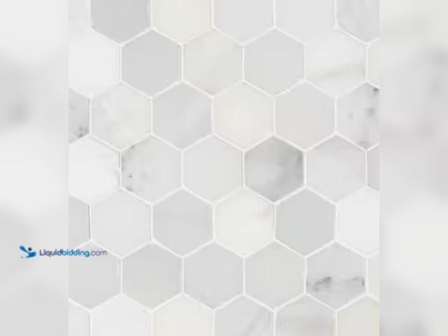 Lot 49-1631141 - APPROX. (9) SQ FT of MSI Arabescato Carrara 2 in. Hexagon 12 in. x 12 in. x 0.38 in. Honed Marble Me...