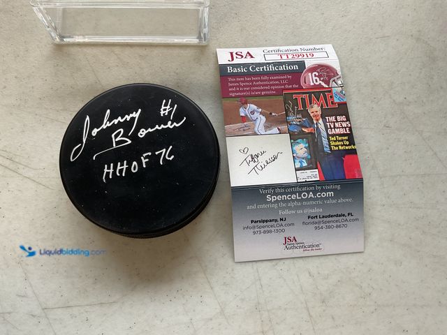 Lot 49-1505778 - COLLECTIBLE TORONTO MAPLE LEAFS LEGEND JOHNNY BOWER HOF AUTOGRAPHED HOCKEY PUCK WITH JSA COA #COINS0...