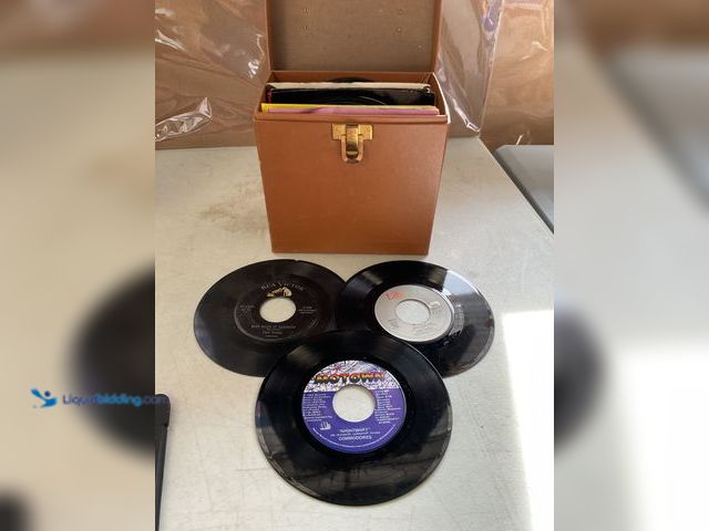 Lot 49-5350463 - Other VINTAGE CASE WITH 60+ VINYL 45 RPM RECORDS FROM VARIOUS GENRES AND TITLES INCLUDING ELVIS PRES...