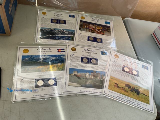 Lot 49-5467376 - LOT OF 5 STATEHOOD QUARTER AND STAMP SETS IN SLEEVES INCLUDING OREGON, NEVADA, COLORADO, NEBRASKA AN...