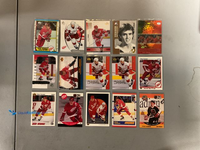 Lot 49-1830583 - COLLECTIBLE AMAZING LOT OF 15 VARIOUS STEVE YZERMAN HOCKEY CARDS INCLUDING UPPER DECK HONOR ROLL, TO...