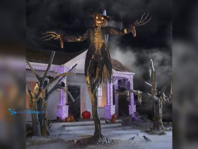 Lot 49-1526297 - Home Accents Holiday 15 ft. Gruesome Grounds Giant-Sized Animated LED Worricrow H10, Model # 25SV248...