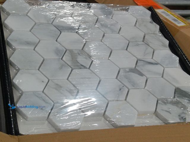Lot 49-2024915 - Approx. (9) Sq. Ft. of  MSI Calacatta Cressa 12.38 x 12.38 in. Honed Hexagon Mosaic Tile with Distin...
