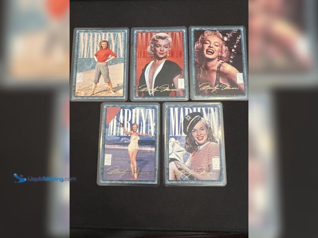 Lot 49-9002 - Lot of (5) Marilyn Monroe gold foil stamped collectible cards with 1 gram silver bar.  .999 Fine Sil...