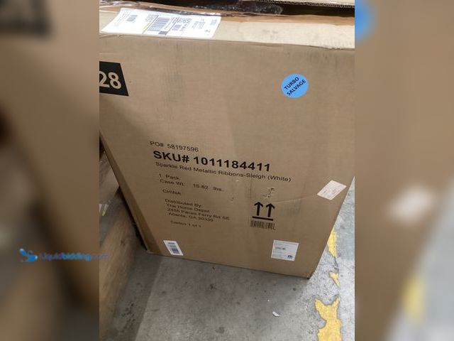 Lot 49-5448772 - White Sleigh Yard Decoration with Red Ribbon. Unused