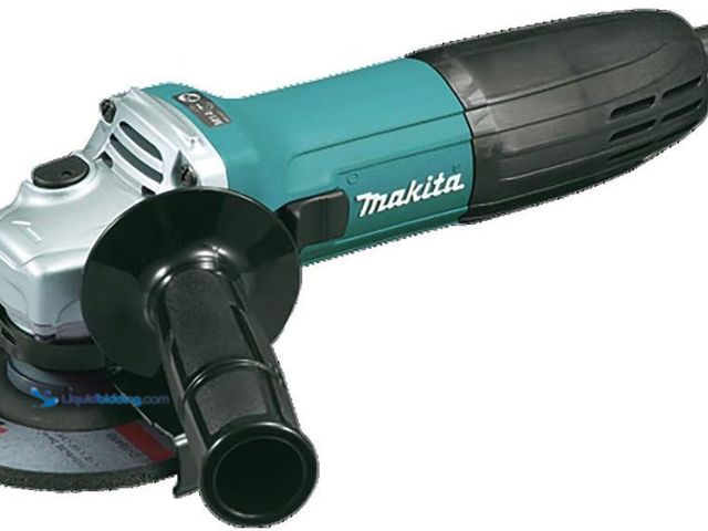 Lot 49-5448744 - Makita GA4530X 4-1/2-Inch Angle Grinder with Grinding Wheels , Blue. Model: GA4530X. Unused