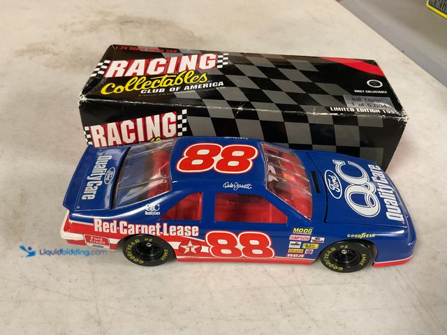 Lot 49-1505697 - COLLECTIBLE ACTION RACING COLLECTABLES BILL ELLIOTT #88 QUALITY CARE 1/24 SCALE DIECAST CAR IN ORIGI...