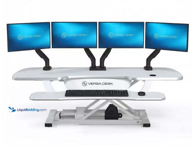 Lot 49-1630658 - VersaDesk PowerPro Electric Standing Desk Converter 48" x 24" - White/White - MSRP $460 - Model #939...