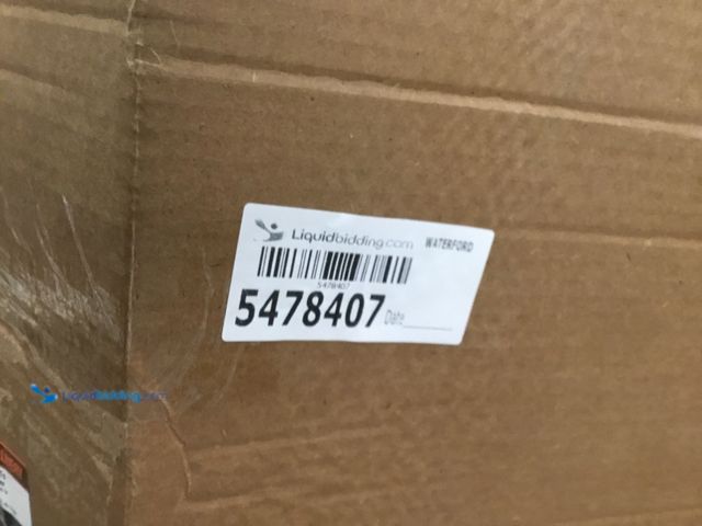 Lot 49-5478407 - Empty Propane Tank. Item is unused.