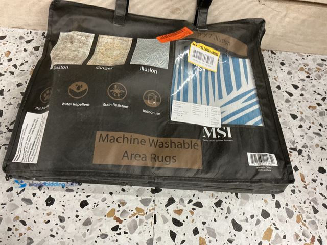 Lot 49-5459885 - MSI Illusion 60 in. x 84 in. Blue Polyester Cotton Geometric Indoor Area Rug. Model #747583214652. U...