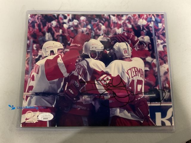 Lot 49-1505934 - WOW! AUTOGRAPHED 8X10 BY THE ONE AND ONLY STEVE YZERMAN WITH JSA COA. AMAZING AUTOGRAPH FOR ANY COLL...