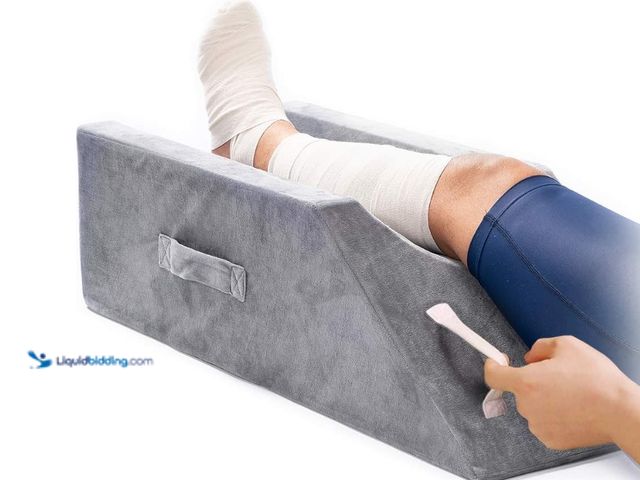 Lot 49-1516412 - LightEase Memory Foam Leg Support and Elevation Pillow w/Dual Handles for Surgery, Injury, or Rest, ...