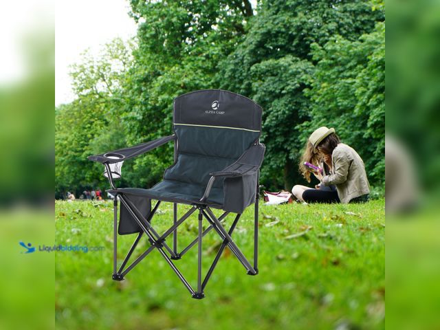 Lot 49-2023141 - Alpha camp green camping chair. Slightly used, scratches.  Ref#PA0923