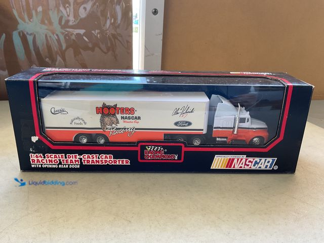 Lot 49-3609229 - Other RACING CHAMPIONS NASCAR 1/64 SCALE DIECAST CAB RACING TEAM TRANSPORTER NEW IN BOX HOOTERS RACI...