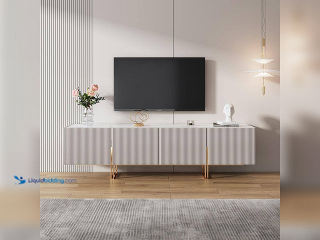 Lot 49-5552929 - JASIWAY
Modern Beige TV Stand Fits TV 85 in. with Gold Metal Leg. Model # J-WB2201D-22BE. Unused