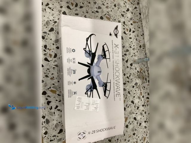 Lot 49-5446953 - SKY RIDER Pro Quadcopter Drone with Wi-Fi Camera, Remote and Phone Holder, White Unused, unable to t...