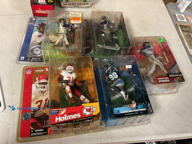 Lot 49-1810320 - COLLECTIBLE 5 MCFARLANE ACTION FIGURES IN ORIGINAL PACKAGES INCLUDING HOLMES, PEPPERS AND MORE