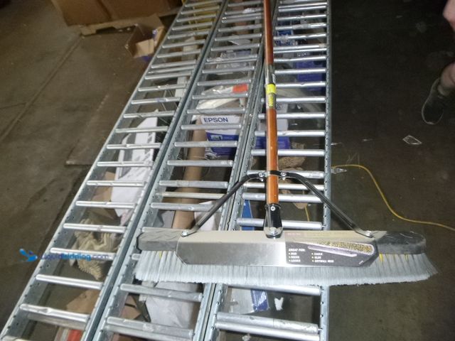 Lot 49-1519040 - Quickie jobsite 24" Multi surface push  broom in stainless steal with heavy duty metal scrapper, Unu...