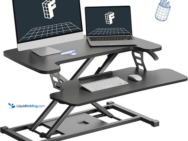 Lot 49-3480413 - FLEXISPOT Standing Desk Converter 28" Wide Height Adjustable Sit Stand Riser, Small Size Desktop Wor...