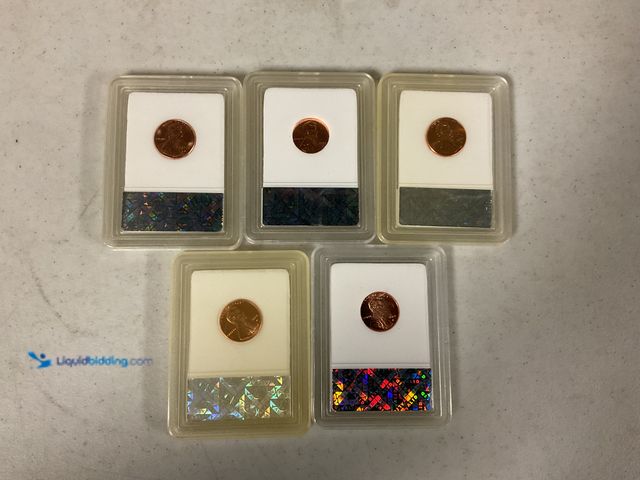 Lot 49-1804587 - 5 UNCIRCULATED ENCAPSULATED LINCOLN PENNIES.