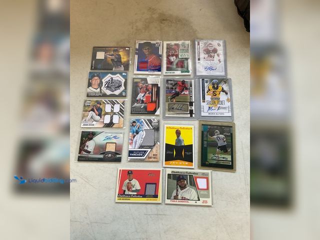 Lot 49-1811338 - COLLECTIBLE 15 GAME USED, JERSEY, PATCH, AUTOGRAPHED, NUMBERED SPORTS CARDS FROM VARIOUS STARS