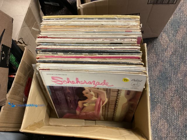 Lot 49-1830541 - COLLECTIBLE LARGE BOX FULL OF PRE-OWNED VINYL RECORDS VARIOUS GENRES AND TITLES INCLUDING GRAND FUNK...