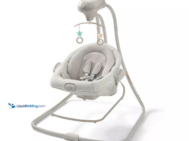 Lot 49-5552781 - Graco DuetConnect LX Baby Swing - Wales. UPC: 047406193226. Unused with attachments. Damage to packa...
