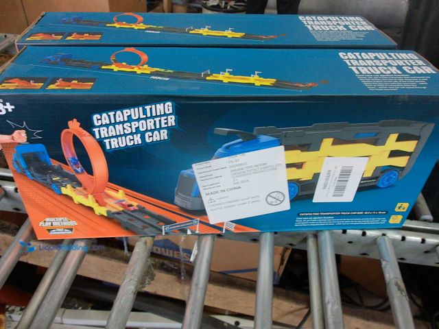 Lot 49-1549130 - (2x) Catapulting Transporter Truck Car Trailer Turns Into Circle Ramp, Model # 15-31, New, 2 Boxes/T...