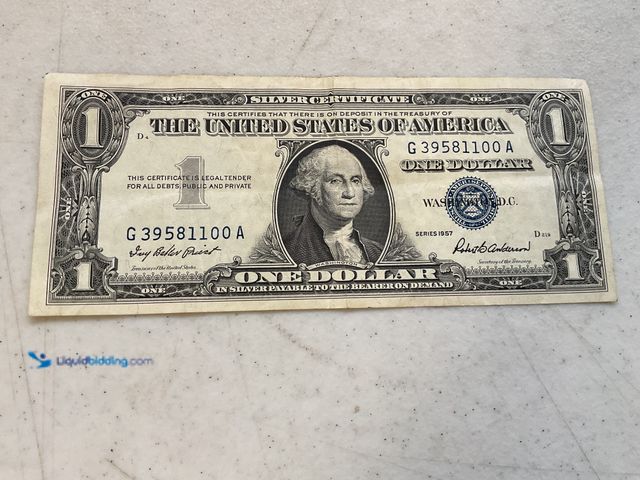 Lot 49-1804567 - 1957 BLUE SEAL US ONE DOLLAR SILVER CERTIFICATE.