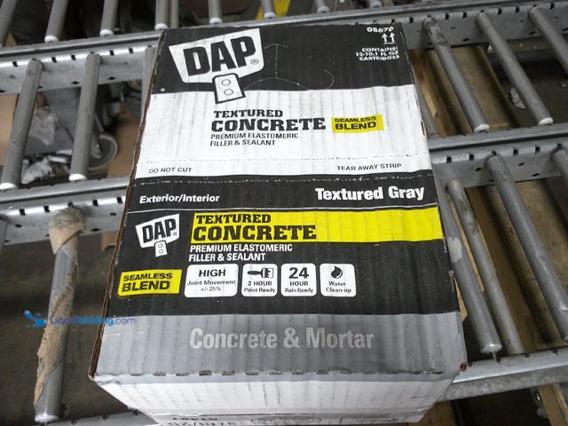 Lot 49-3464316 - (Lot Of 12) DAP 10.1 oz. Gray Textured Concrete Premium Elastomeric Filler and Sealant, Model# 08676...
